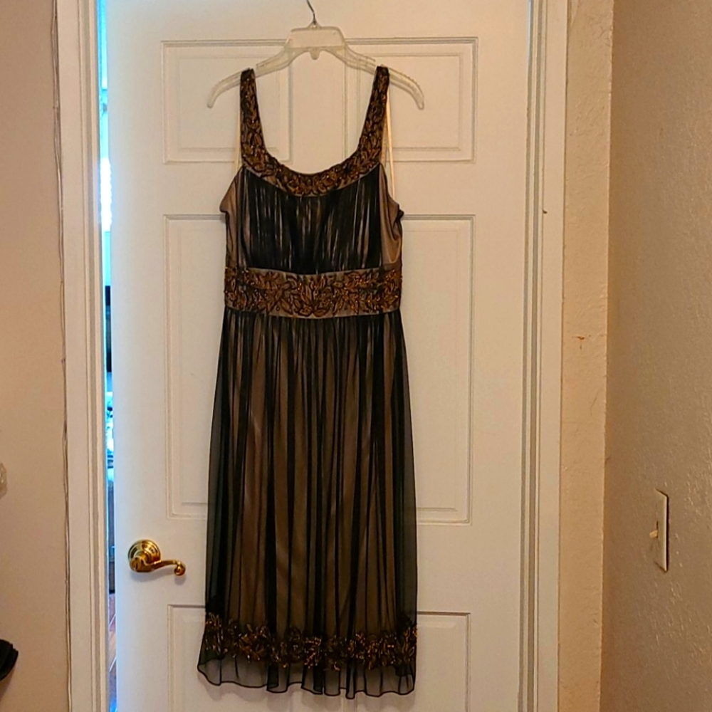 New without tags. Evening wear with sequin